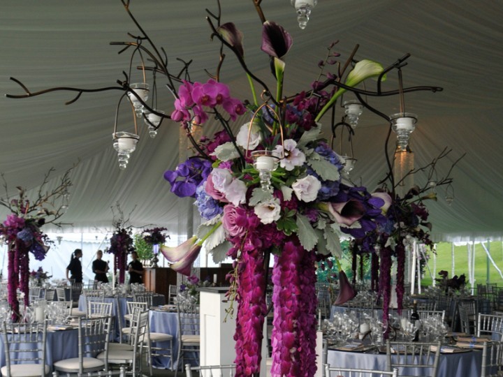 Flowers in tent at a Romantic style wedding