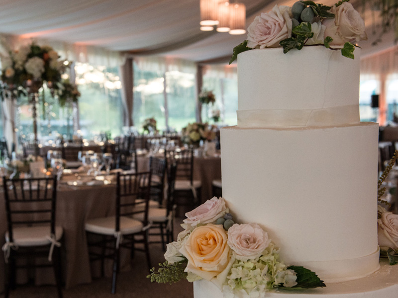 White wedding cake with roses