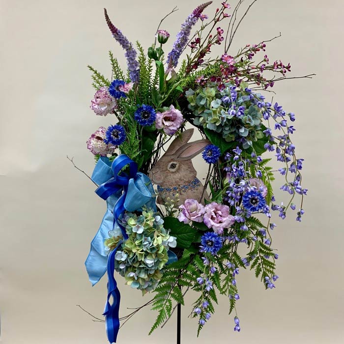 Easter wreath with silk flowers and bunny