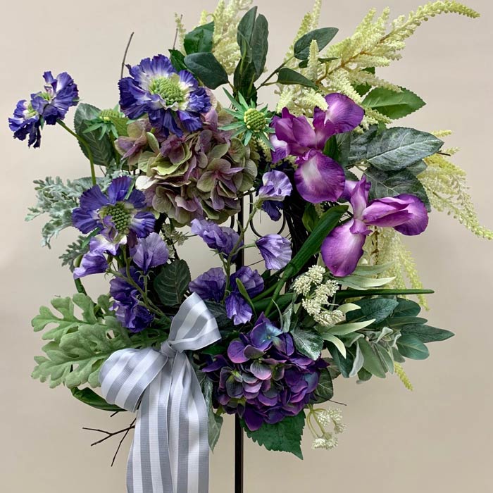 Silk flower wreath with ribbons