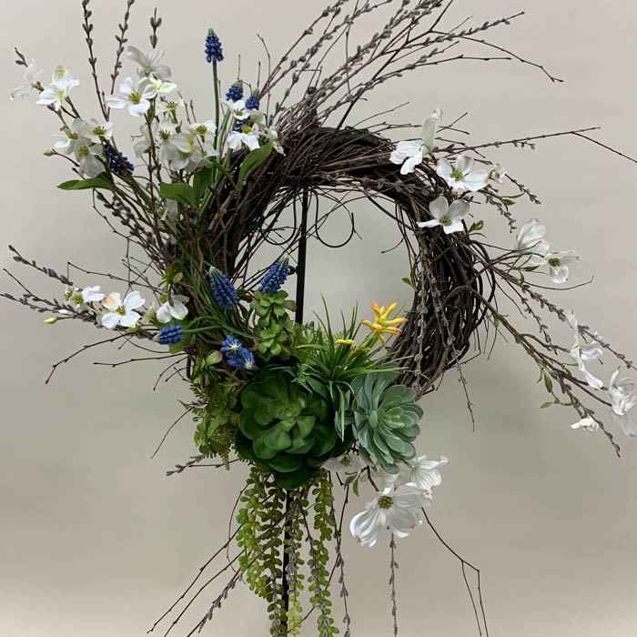 Silk flower wreath with spring blossoms